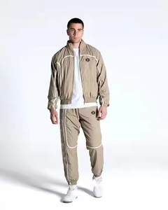 Chándal de nailon con logotipo personalizado de alta calidad, conjunto cortavientos de entrenamiento informal, conjunto de 2 piezas con capucha y cremallera, conjunto de chándal Unisex - Product Image 1