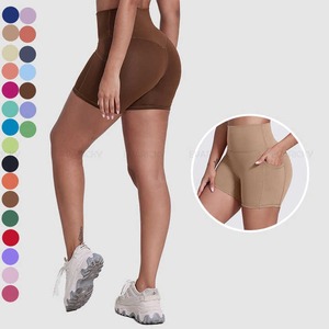 กางเกงขาสั้นออกกำลังกายเอวกลางไร้ตะเข็บแบบรัดรูปสำหรับผู้หญิง เป็นมิตรกับสิ่งแวดล้อม ปิดด้วยยางยืด ลายเรียบ สำหรับวิ่ง โยคะ ฟิตเนส - Product Image 2