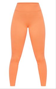 กางเกงเลกกิ้งเอวสูงไร้รอยต่อสำหรับผู้หญิงกางเกงเล่นโยคะฟิตเนสยิมไร้ตะเข็บเย็บด้านหน้าโลโก้ตามสั่ง - Product Image 4