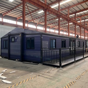 40ft struttura <span class=keywords><strong>nera</strong></span> due camere da letto due bagni prefabbricati <span class=keywords><strong>casa</strong></span> modulare espandibile con tetto inclinato e padiglione laterale - Product Image 1