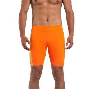 Pantalones cortos de compresión de tela elástica y suave de color naranja para hombre, personalizables, a precio económico, OEM. - Product Image 1