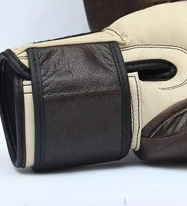 Guante de boxeo de gran oferta hecho de cuero de vaca de primera calidad en colores personalizados y diseño sin logotipo Guante de boxeo de entrenamiento - Product Image 5