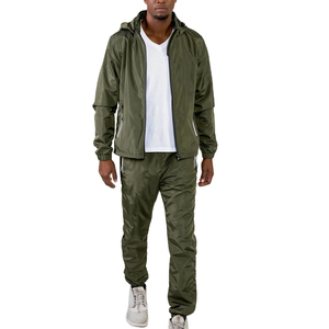 Chándal informal de invierno OEM para hombre, elegante traje de jogging de nailon con logotipo personalizado, conjunto cortavientos con patrón sólido de algodón 100% - Product Image 1