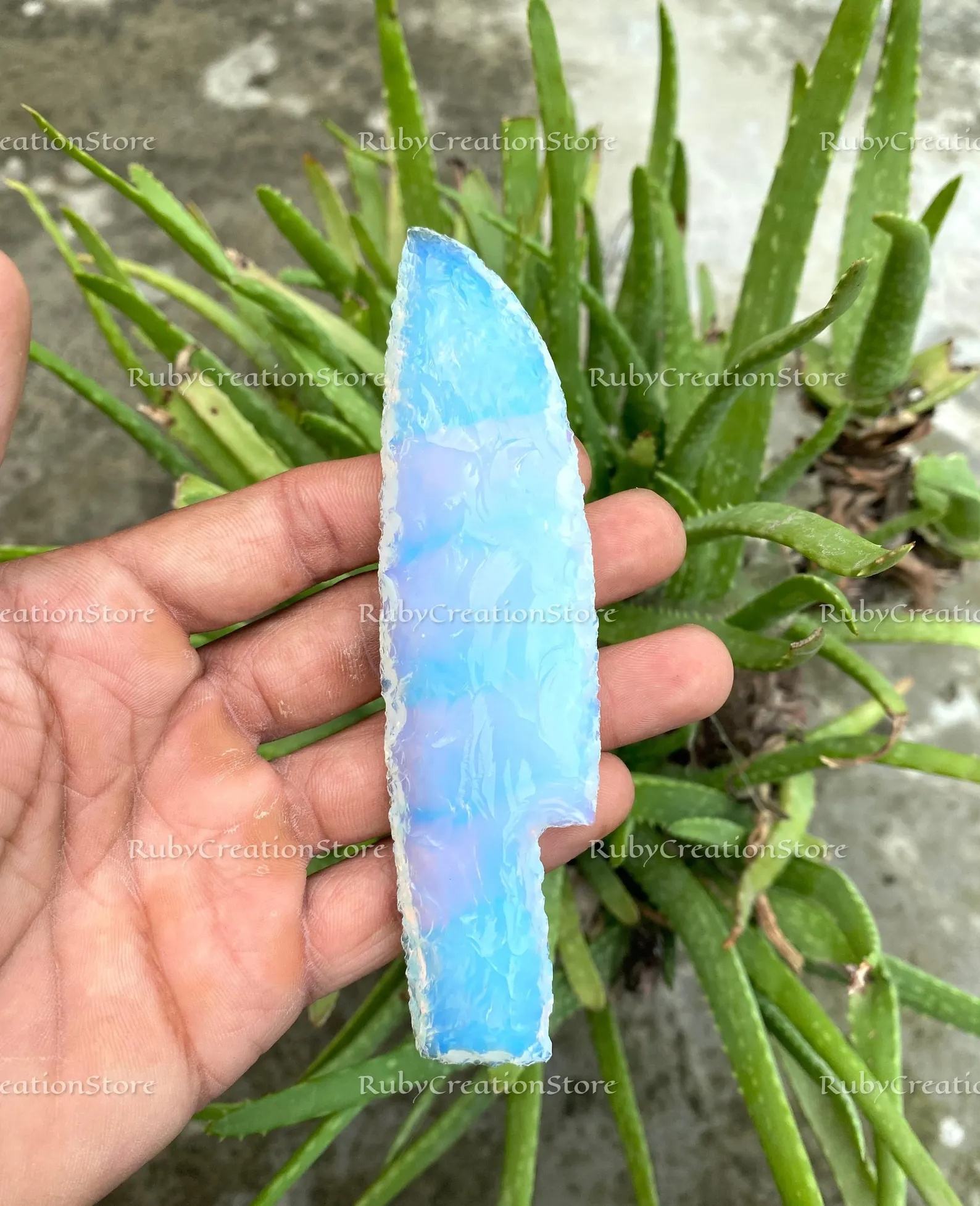 Iridescent white with soft blue hues