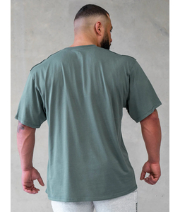 Camiseta Deportiva de Poliéster para Hombre, Diseño OEM, Secado Rápido, Cuello Redondo, para Entrenamiento, Ejercicio, Gimnasio y Deporte - Product Image 6