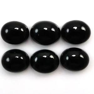 Piedra de espinela negra Natural de 7mm y 9mm, cabujones semipreciosos lisos ovalados, tamaño calibrado suelto, Parte posterior plana, fabricación de joyas de piedras preciosas - Product Image 1