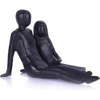 Künstlerische Metallpaare inspirieren die Wertschätzung für die Liebe als Kunst und als Verpflichtung, schön dargestellt von ARTISTIQUE.