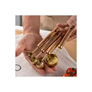 Gold Stainless Steel <b>Measuring</b> <b>Spoon</b> Set with Wooden Handle 4 Pcs Small Scoops - Product Image 1