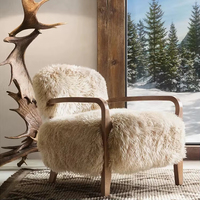 Fauteuil de loisirs Taddeus en tissu noir brossé tendance et structure en bois massif pour salon, hôtel, appartement