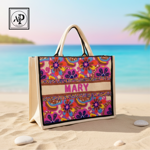 Bolsa de mano personalizada y elegante con paneles florales bordados vibrantes y diseño de nombre personalizado. Duradera, espaciosa y ideal para viajes. - Product Image 1