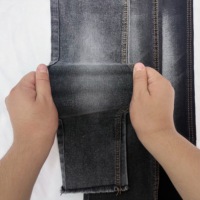 Tissu Denim Noir 8.9oz 65% Coton 33.2% Polyester 1.8% Spandex N/B Twill Stretch pour Garçons Filles Jeans Fournisseurs Tissé