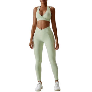 Haute qualité Gym Sport porter soutien-gorge et Scrunch bout à bout croisé coupe taille Leggings pantalon Fitness femmes Yoga ensembles taux de gros - Product Image 1