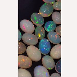 66 pièces opale éthiopienne naturelle avec feu 12x10 14x10 16x12 20x16mm cabochon ovale 304 Cts Iroc ventes qualité pierres précieuses cabine US $487 - Product Image 4
