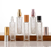 Botol Parfum Kaca Mewah Modern dengan Dekorasi Permukaan Embos, Ukuran Kustom 15ml 30ml 50ml 100ml
