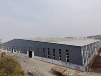 Nave Industrial de Gran Envergadura con Estructura de Acero Resistente para Fábrica o Almacén de Manufactura Industrial