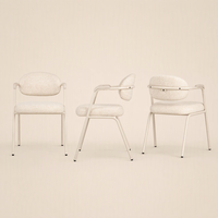 Fauteuil de salle à manger moderne et élégant de style nordique, avec dossier ouvert, revêtement en tissu doux et structure métallique