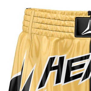 Shorts MMA personnalisés pour hommes, impression par transfert thermique, jaune et noir, satin, logo imprimé, séchage rapide, respirant, léger - Product Image 3