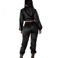 Streetwear noir personnalisé de haute qualité Pantalon de survêtement réfléchissant pour jogging Survêtement réfléchissant à rayures pour femmes