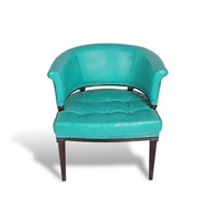 Fauteuil bas en cuir turquoise avec structure en bois d'akazie massif, élégant fauteuil d'appoint pour hôtels et salons