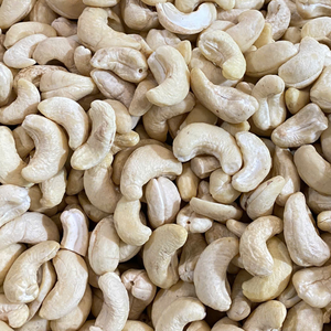 Venta Caliente de Nueces de Anacardo Crudas W180 de Alta Calidad, Marca SANTIGO de Vietnam, Servicio OEM ODM, 24 Meses de Vida Útil, Comestibles - Product Image 1