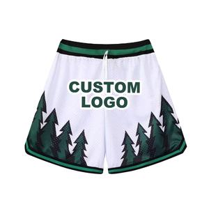 กางเกงขาสั้นสำหรับฝึกซ้อมบาสเก็ตบอลของผู้ชายกางเกงขาสั้นโพลีเอสเตอร์ตาข่ายแบบระเหิดเข้ารูปพิมพ์โลโก้แบบสองด้านลึกมีกระเป๋าสำหรับฤดูร้อน - Product Image 1