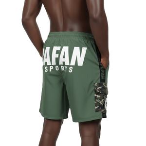 กางเกงว่ายน้ำผู้ชาย ผ้าโพลีเอสเตอร์ทาสลอน 130 GSM แห้งเร็ว สีเขียวมะกอก แถบข้างสีดำ ปักโลโก้ - Product Image 5