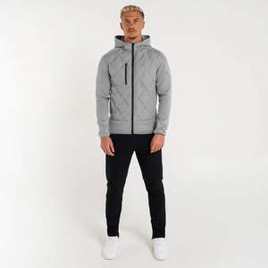 Black Chevron Quilted Hybrid <b>Jacket</b> Sporty Style with <b>Neoprene</b> Sleeves Hooded Design Durable Zipper Pulls and Modern Fit - Product Image 1