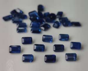 พลอยไคยาไนต์ธรรมชาติทรงแปดเหลี่ยมเจียระไนแบบเหลี่ยมเพชรพลอย ขนาด 3x5 มม.-8x10 มม. สีฟ้ามีประกายสี สำหรับทำเครื่องประดับ ขายส่ง - Product Image 5
