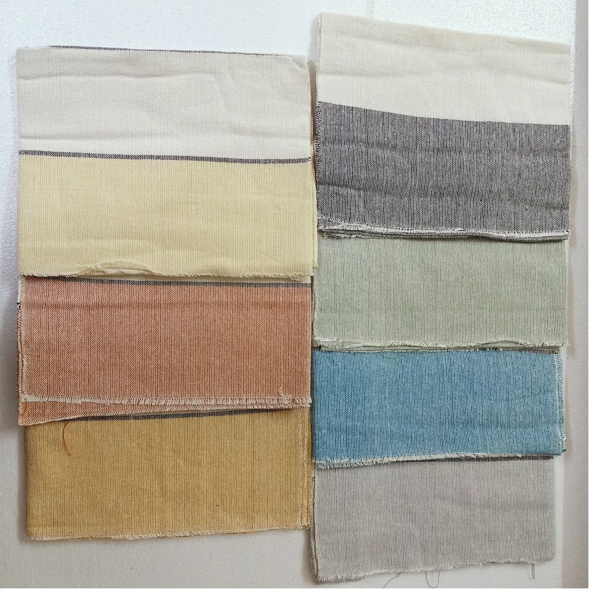 custom made hand woven cotton towels in assorted colors made for resale by home textile stores