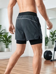 Shorts de sport pour homme de haute qualité à séchage rapide avec poches, taille élastique, longueur mi-cuisse, gris uni, en polyester, pour la course et l'entraînement - Product Image 4