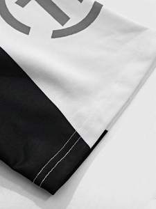 Conjunto de chándal con panel lateral en blanco y negro para hombre, Camiseta con estampado gráfico con detalle lateral doble y Jogger elástico, logotipo personalizado, atuendo conjunto - Product Image 4