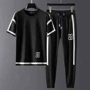 OSTROWEARS ENTERPRISES-Chándal de nailon de alta calidad para hombre, conjunto ligero impermeable de verano con pantalones cortos multibolsillos - Product Image 2