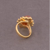 Vente en gros de bagues élégantes en laiton plaqué or de créateur en cristal orange avec diamant et pierre de soleil, bijoux de mode, bagues naturelles vente en gros