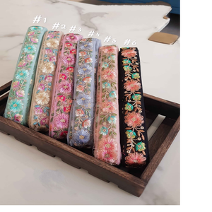 Bordado floral hecho a medida en varios colores en diseños étnicos y en tela de base de red en una pulgada de ancho y para reventa - Product Image 1