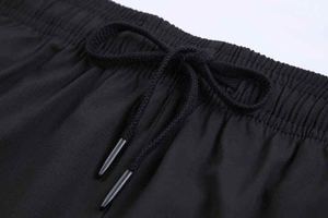 Short en maille de soie glacée pour hommes de haute qualité vêtements de sport décontractés à coupe ample à séchage rapide avec tissu respirant doux et taille élastique - Product Image 4