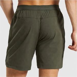 Nouveau Style de haute qualité en gros hommes entraînement Gym Shorts poches latérales respirant séchage rapide couleur unie hommes Fitness Shorts - Product Image 3