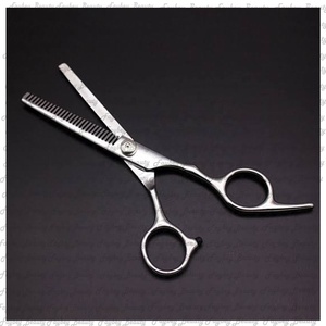 กรรไกรตัดผมเซรามิกแบบโค้งบางทำจากโรงงาน - Product Image 2