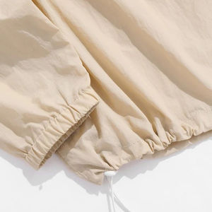 Vente en gros de short coupe-vent unisexe pour hommes, ensemble short coupe-vent zippé de couleur fendue en polyester 100%, vêtements de jogging - Product Image 6