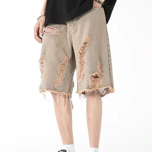 กางเกงขาสั้นผ้ายีนส์วินเทจเรียการเย็บปะติดปะต่อกันและขอบดิบ-มีเอกลักษณ์และมีสไตล์สำหรับงานเลี้ยงเทศกาลและแฟชั่นในชีวิตประจำวัน - Product Image 1