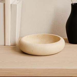 Bol en pierre de travertin avec un design arrondi et lisse, offrant une élégance naturelle, une fabrication durable et un style de décoration intérieure polyvalent - Product Image 1