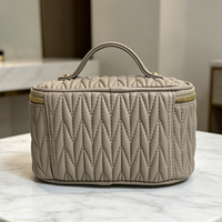 Sac de rangement de maquillage portable de luxe de haute qualité, en PU crème, pour femmes, avec fermeture éclair, élégant et durable