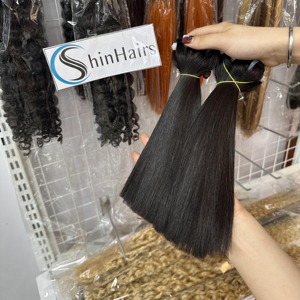 Top 2024 cheveux bruts en gros os droit naturel noir couleur vietnamien vierge faisceaux de cheveux humains extensions de trame - Product Image 1