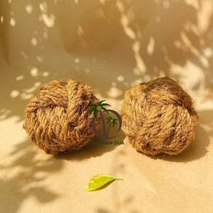 Juguete masticable de coco sostenible para mascotas-Juguete de cuerda natural hecho a mano para perros y animales pequeños - Product Image 1