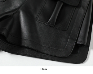 Shorts en cuir PU noir satiné taille haute avec poches et fermeture boutonnée, style motard pour femme - Product Image 6
