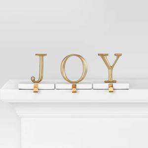 Elegante soporte de calcetín de Navidad de Metal dorado y bronce para chimenea, organizador colgante festivo de vacaciones de Metal - Product Image 1