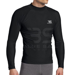 Diseña tus propias mangas lisas de color negro Rash Guard Logotipo personalizado Hombres Rash Guard Hecho en Pakistán - Product Image 1