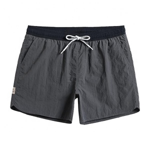 Pantalones cortos deportivos de verano con logotipo personalizado para hombre, diseño liso teñido de secado rápido, transpirables, para nadar en la playa, diseño de malla deportiva, deportes en blanco - Product Image 6