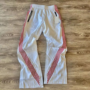 High Quality Customized Elastic Mid Casual Track <b>Joggers</b> Flared Pant Baggy Distressed Wide Legs Wind Breaker <b>Polyester</b>/Cotton - Product Image 4