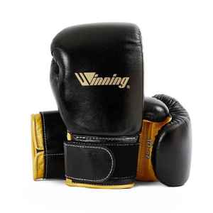 Guantes de combate ganadores con logotipo personalizado de fabricante profesional Nuevo diseño de cuero Equipo de entrenamiento MMA - Product Image 1