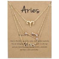 Vente flash Mode 3 pièces Symbole Ciel étoilé Lettre anglaise Argent Or 12 Bijoux du zodiaque Ensemble de colliers pour femme avec papier